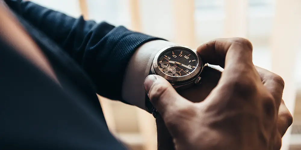 Man with mechanical watch